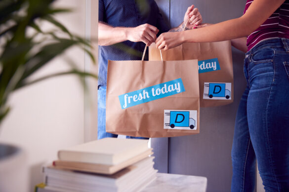 A closeup of bold typography on a paper bag. In 2023, we expect to see more brands use bold typography. 